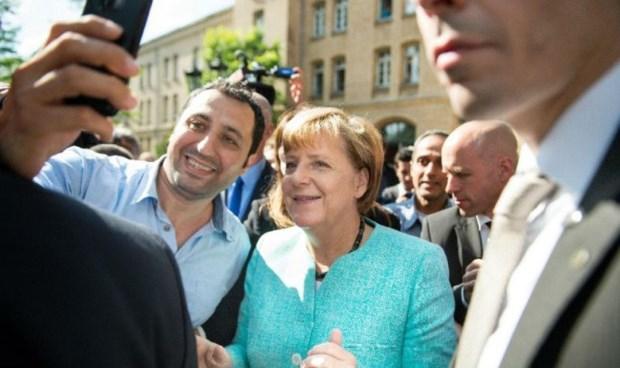 Angela Merkel - “Mutti - Người mẹ” Đức của EU - 0