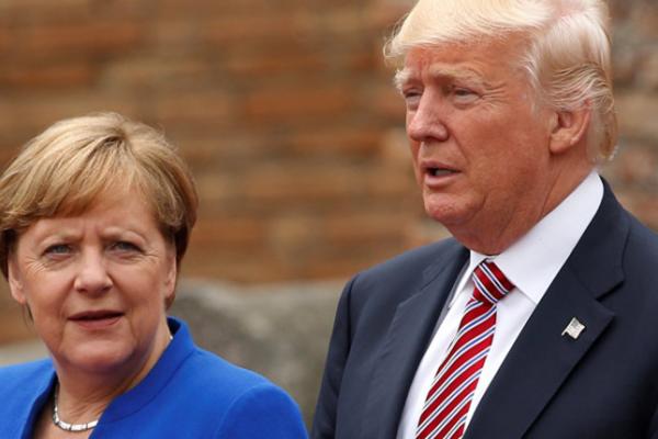 Tổng thống Trump: Chính sách nhập cư đã phá hỏng hình tượng của Thủ tướng Đức Merkel - 0