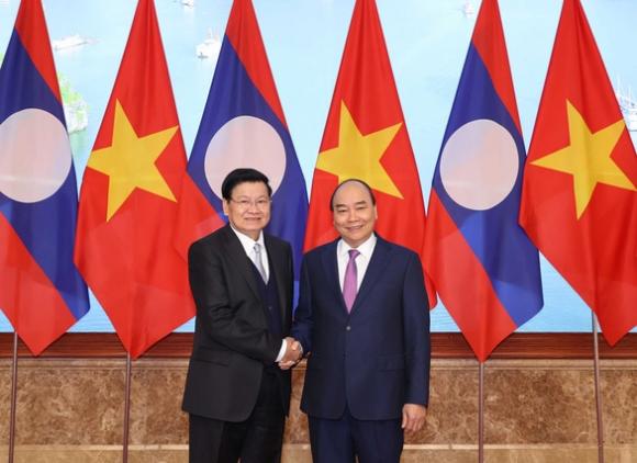 42 1 Viet Nam Lao Khang Dinh Phoi Hop Ung Ho Nhau Tren Cac Dien Dan Quoc Te