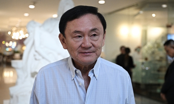 1 Vua Thai Lan An Xa Cho Cuu Thu Tuong Thaksin