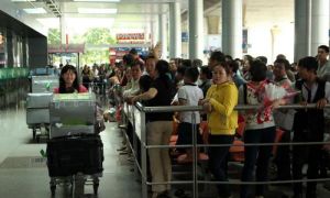 Việt kiều về nước: Xách bao nhiêu tiền cho vừa