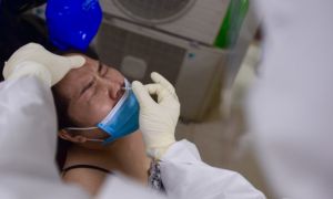 Người tiêm mũi 2 đủ 14 ngày hoặc vừa khỏi COVID-19: không buộc phải xét nghiệm...