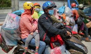 Các địa phương quy định thế nào đối với người dân về quê ăn Tết?